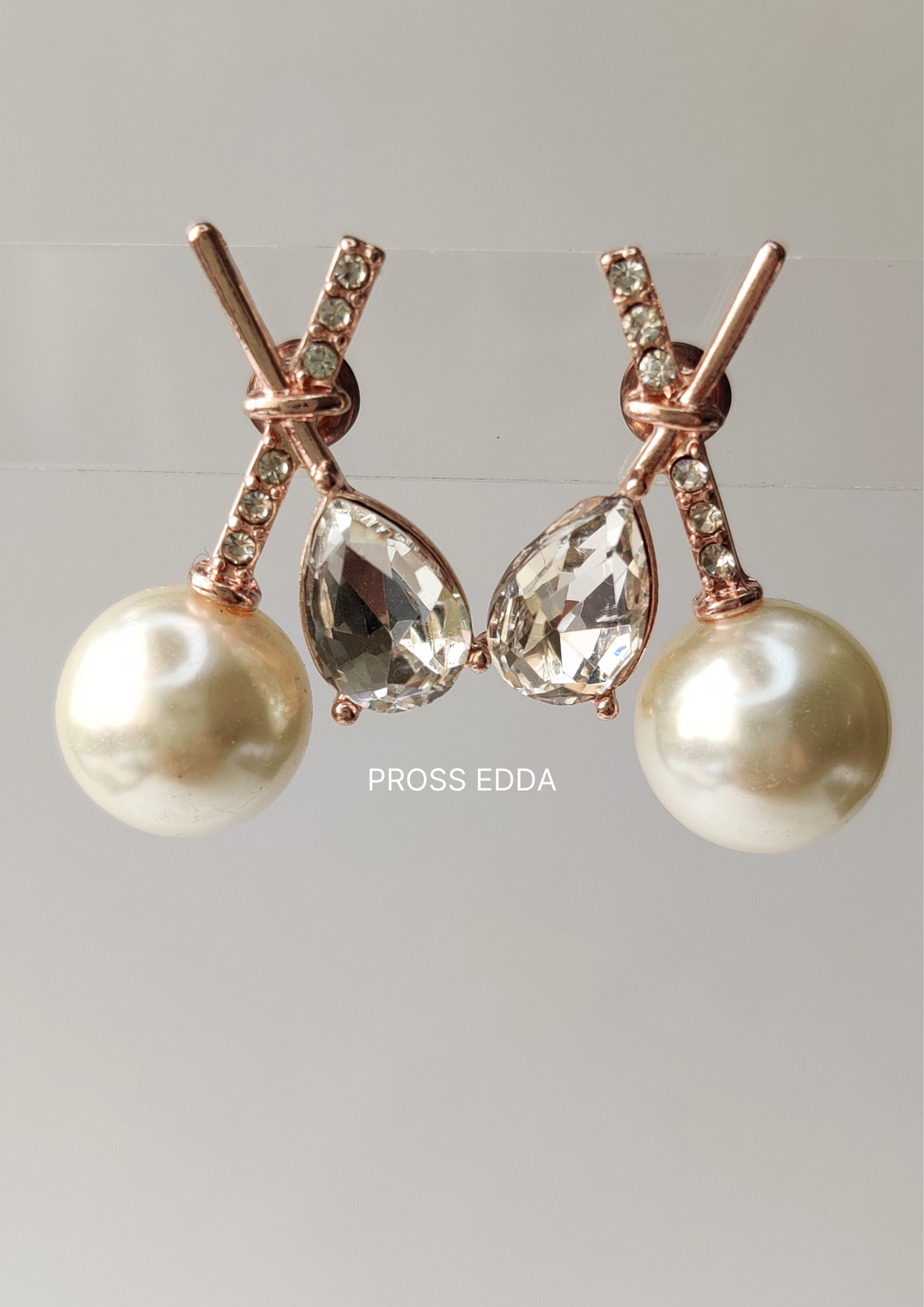 GRACEFUL CROSSED PEARL ELEGANCE STUDS EARRING