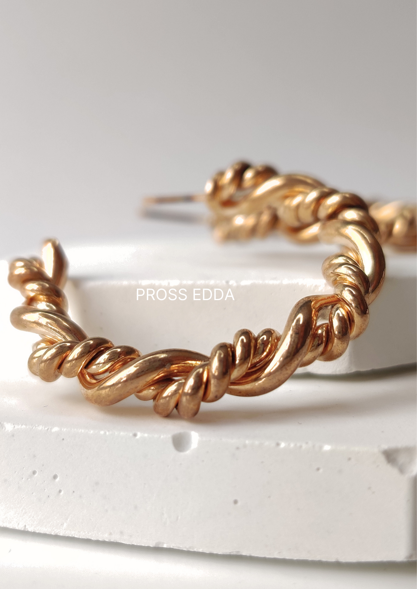 TWISTED ROPE GOLDEN OPEN HOOP EARRING