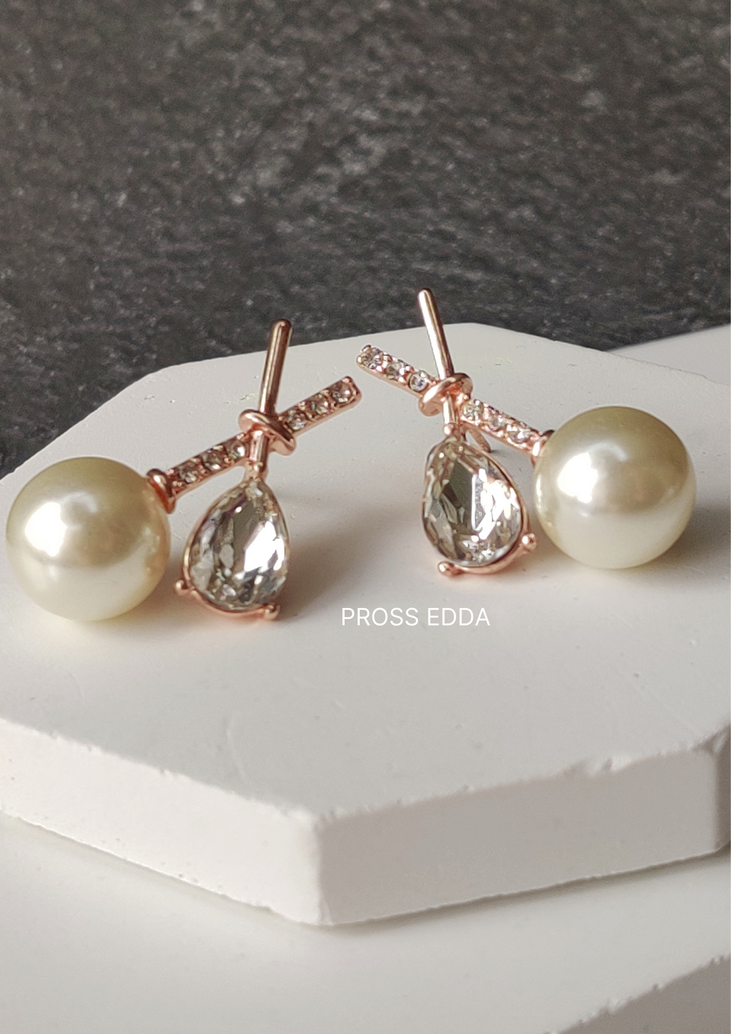 GRACEFUL CROSSED PEARL ELEGANCE STUDS EARRING