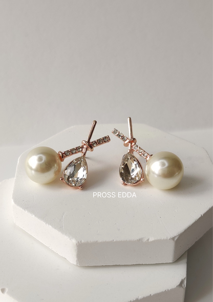 GRACEFUL CROSSED PEARL ELEGANCE STUDS EARRING